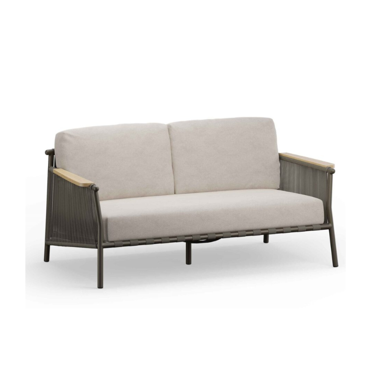 Beige sofa with wicker frame on a white background