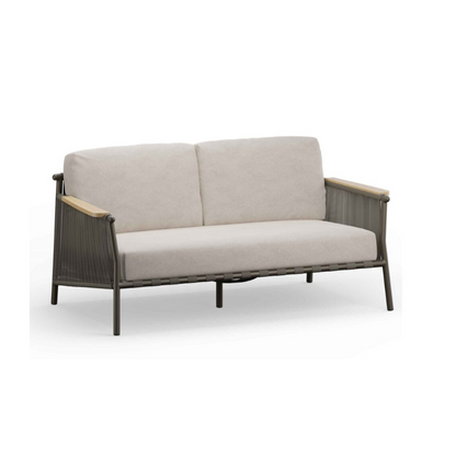 Beige sofa with wicker frame on a white background