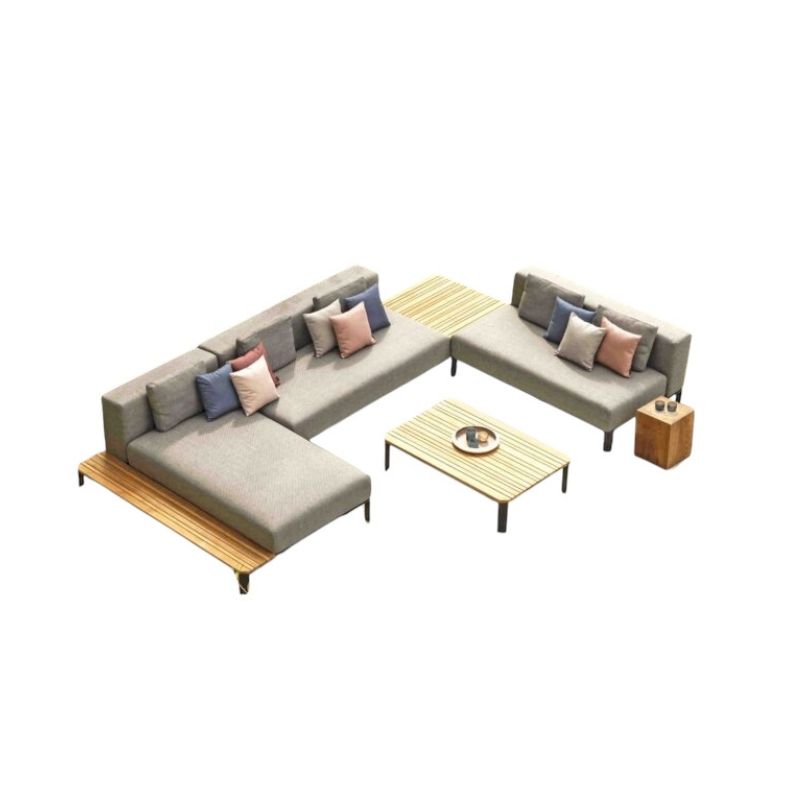 Gray sectional sofa with wooden coffee table and side tables on a white background