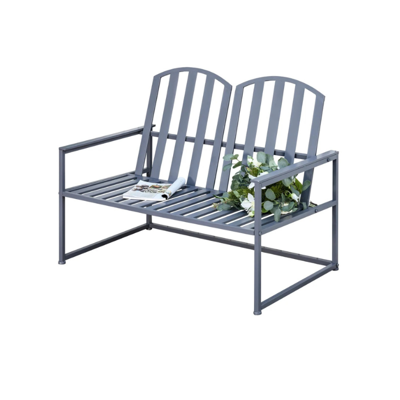 Gray metal bench with a plant on a white background