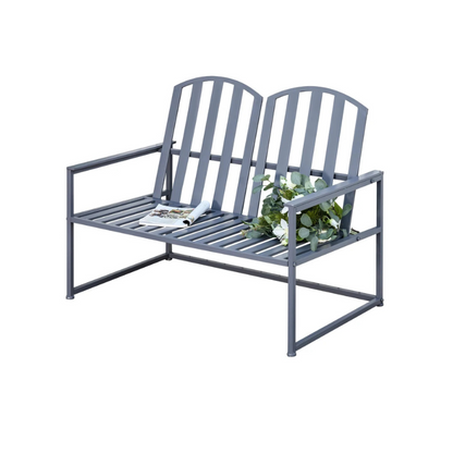 Gray metal bench with a plant on a white background