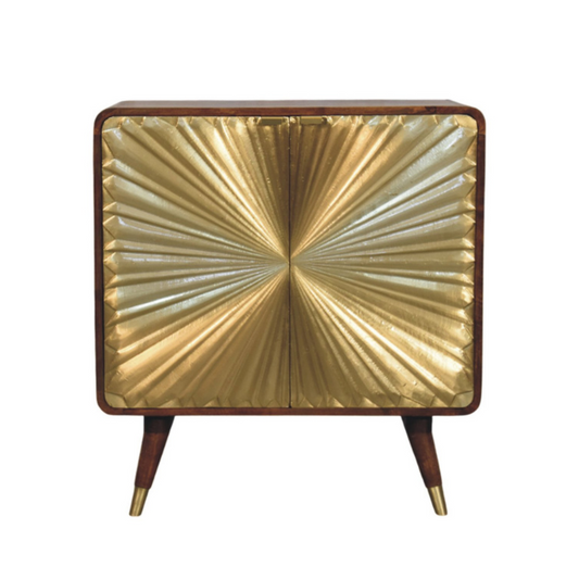 Decorative cabinet with gold sunburst design on a white background