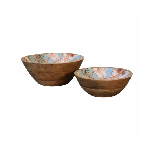 Two wooden bowls with floral patterns on a white background