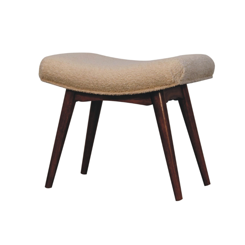 Beige ottoman with wooden legs on a white background