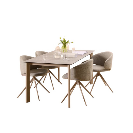 Dining table set with four chairs on a white background