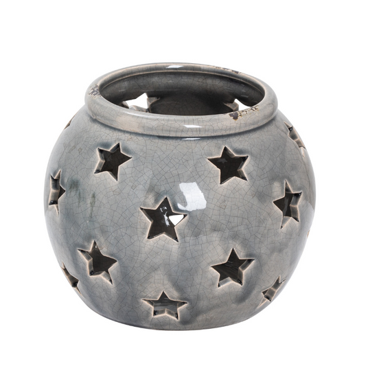 Gray ceramic lantern with star-shaped cutouts on a white background