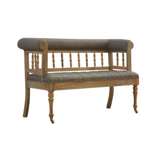 Wooden bench with upholstered seat and backrest on a white background