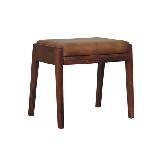 Brown leather stool with wooden legs on a white background