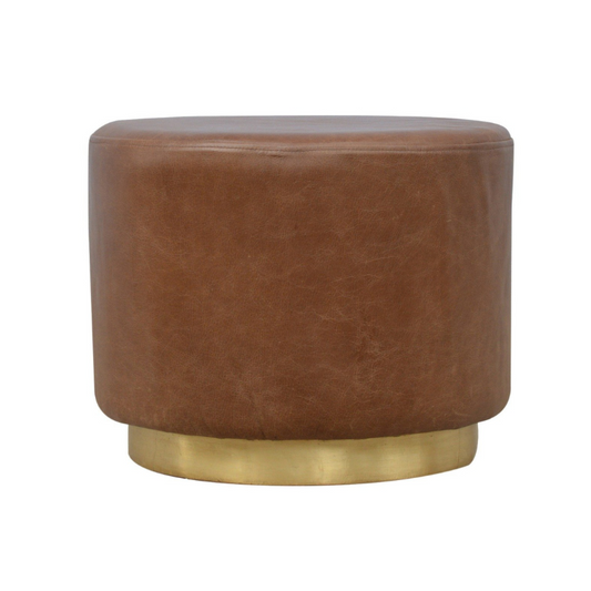 Brown leather ottoman with a gold base on a white background