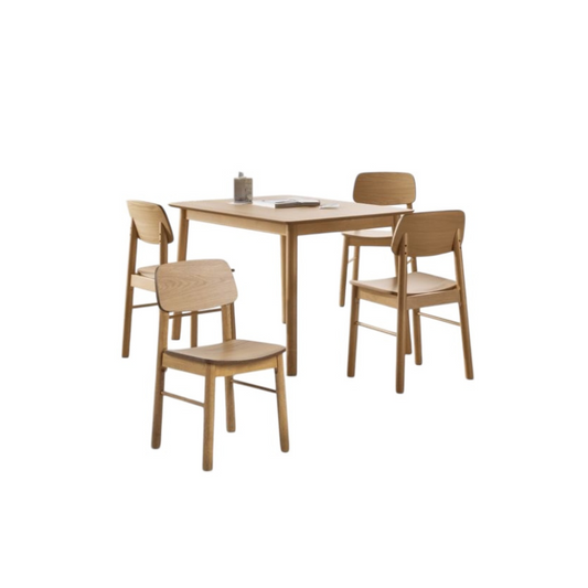 Wooden dining table with four chairs on a white background