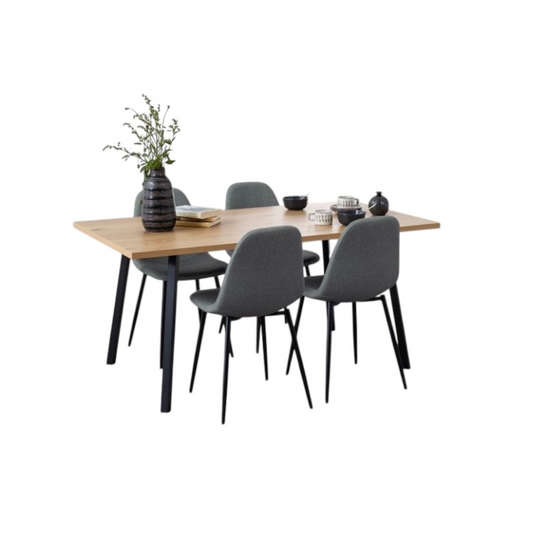 Dining table set with four gray chairs on a white background