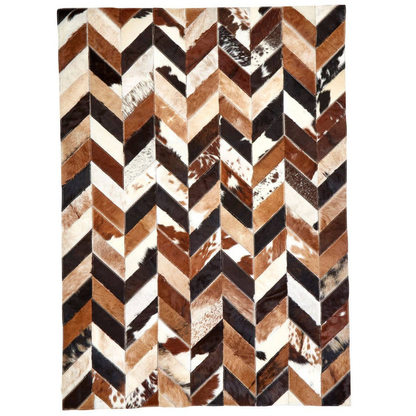 Rug with a chevron pattern featuring brown, black, and white colors on a white background