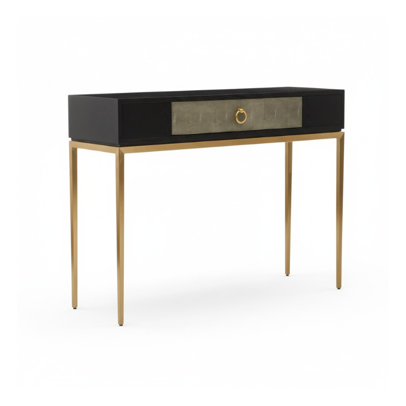 Console table with black top and gold legs on a white background