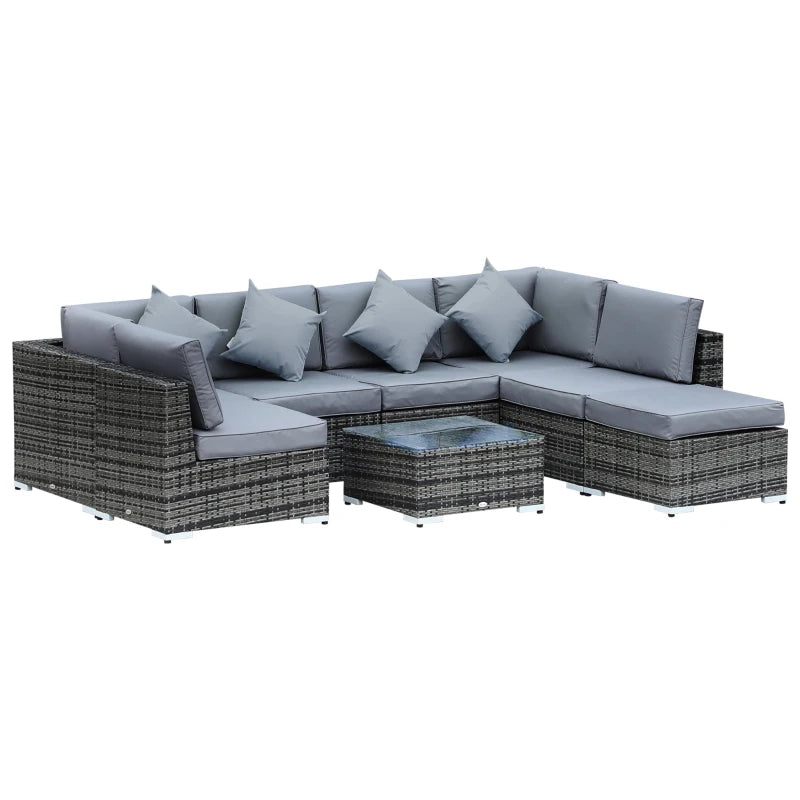Outdoor patio furniture set with gray cushions on a white background