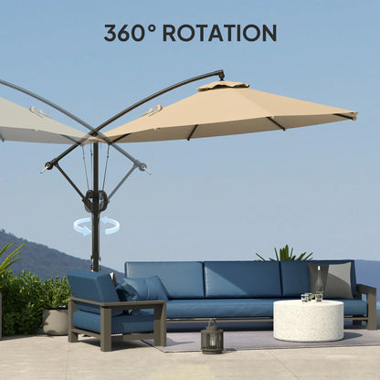 Beige patio umbrella with 360-degree rotation feature on a patio setting with blue sofa and table.