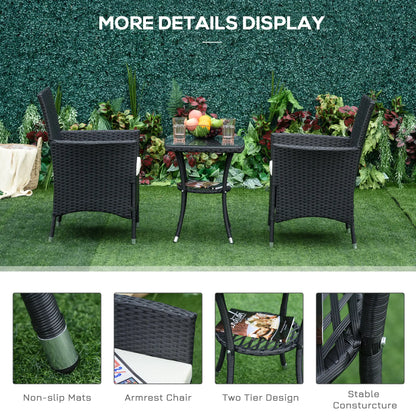 Outdoor furniture set with table and chairs on grass, surrounded by plants.
