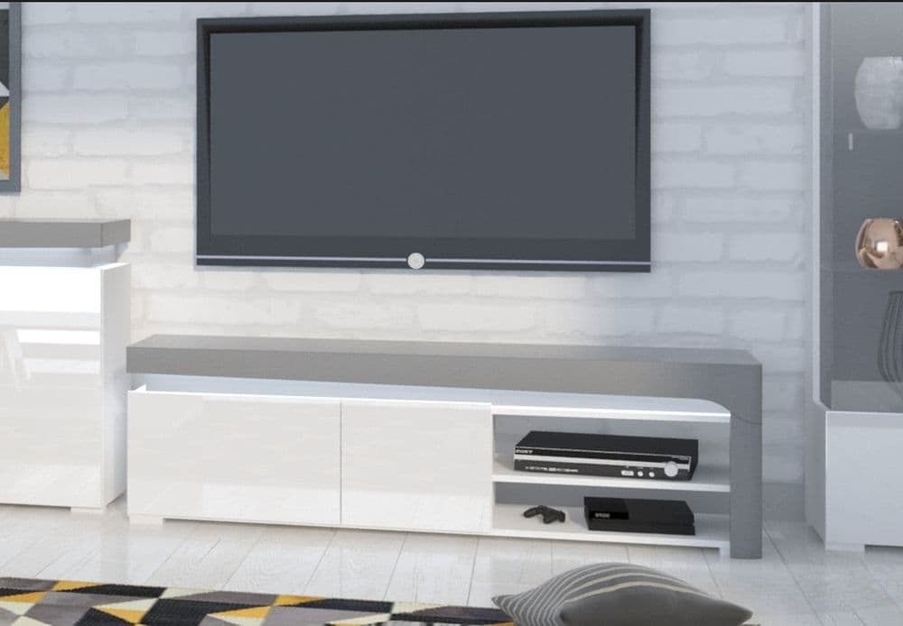Modern TV stand with a television mounted on a brick-patterned wall.