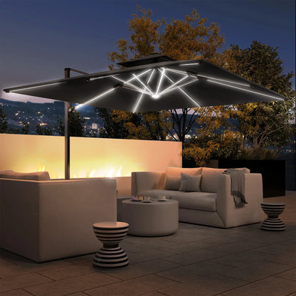 Outdoor patio with illuminated umbrella, couch, and coffee table at night.