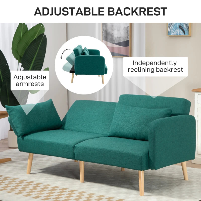 Teal sofa with adjustable backrest and armrests in a living room setting.
