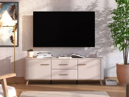 Modern living room with a TV mounted on the wall above a white entertainment console.