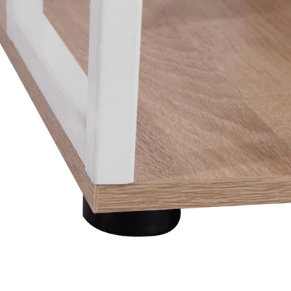 Close-up of a wooden table corner with a white edge and black leg on a white background