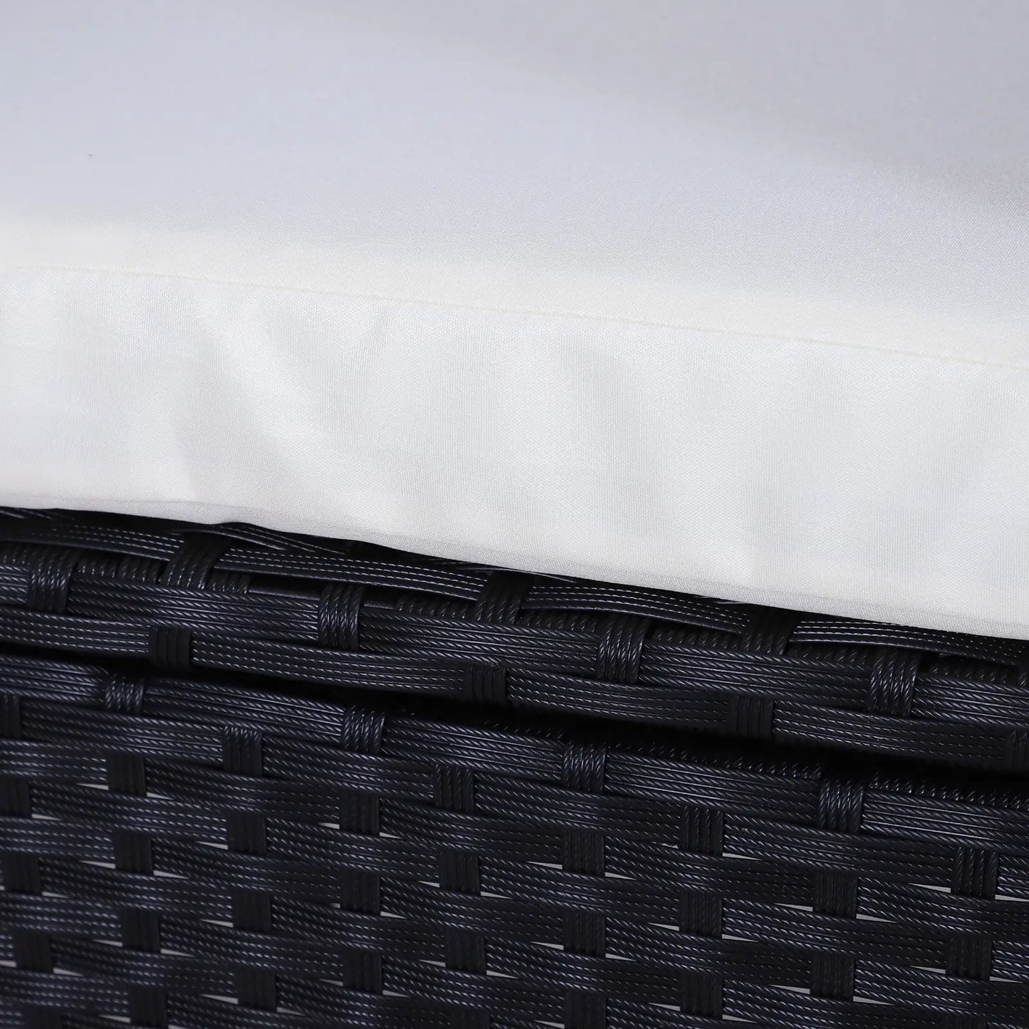 Close-up of a black woven basket with a white background
