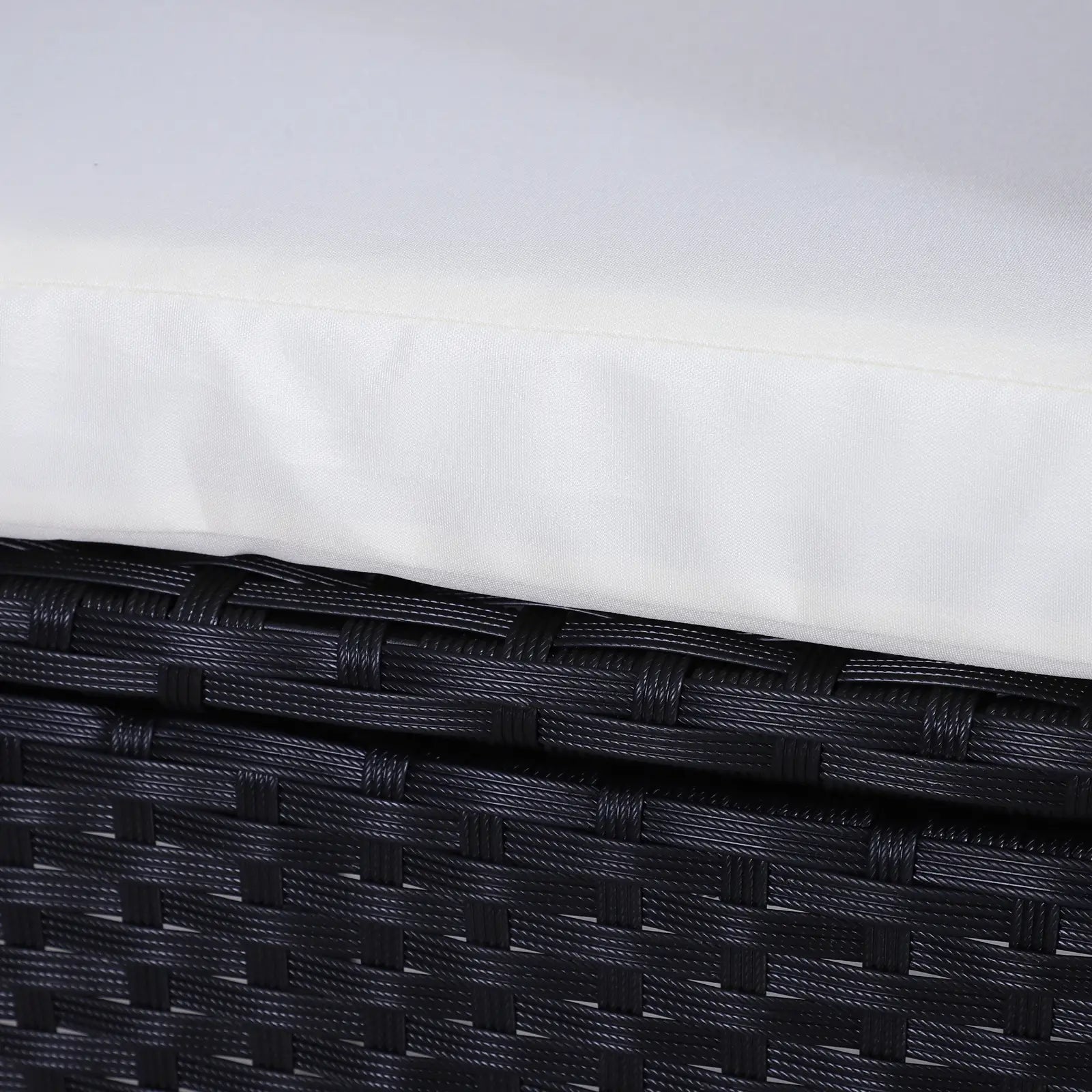 Close-up of a black woven basket with a white background