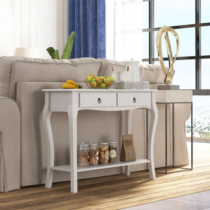White console table in a living room with a couch and decorative items.