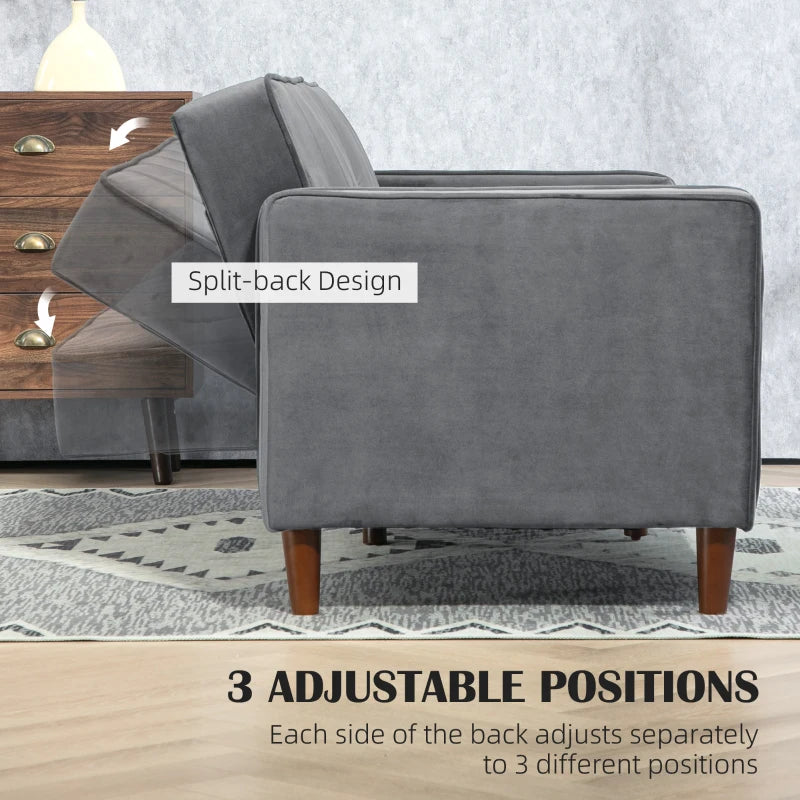 Gray armchair with split-back design in a living room setting