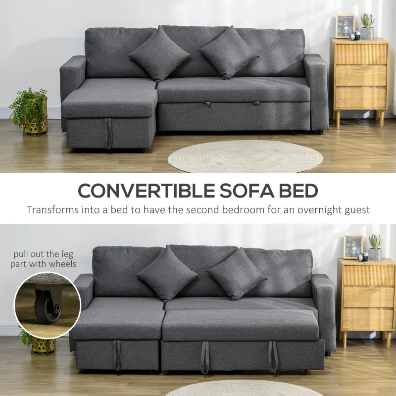 Gray convertible sofa bed in a room setting with wooden furniture and decor.