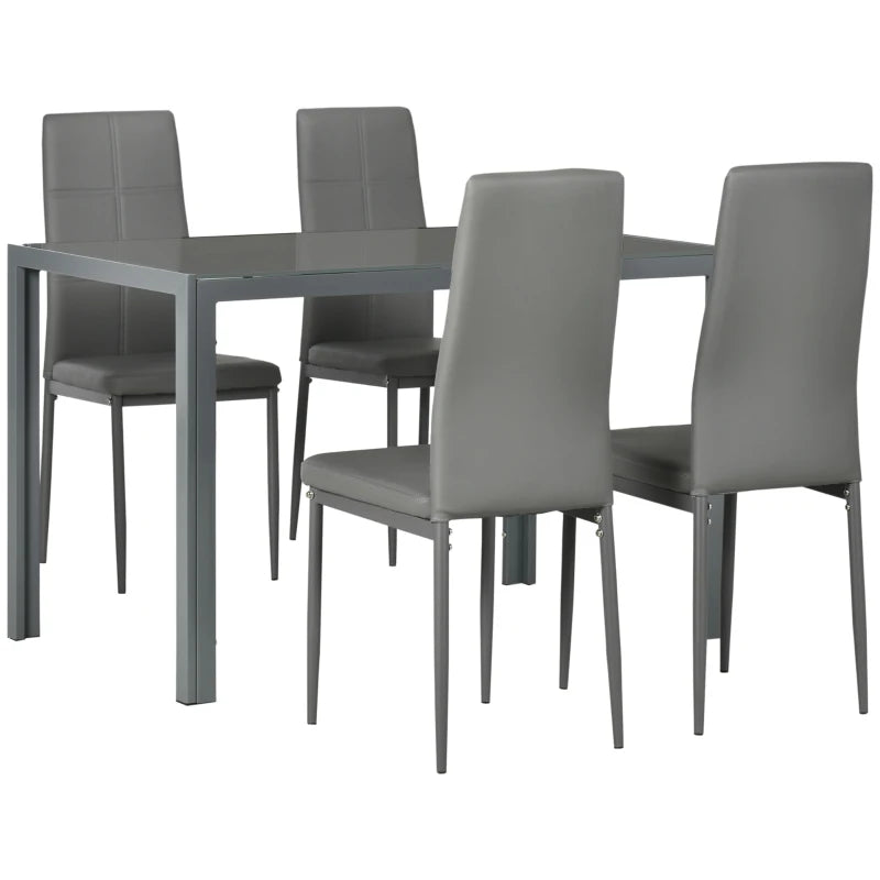 Gray dining table with four matching chairs on a white background