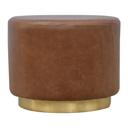 Brown leather ottoman with a gold base on a white background