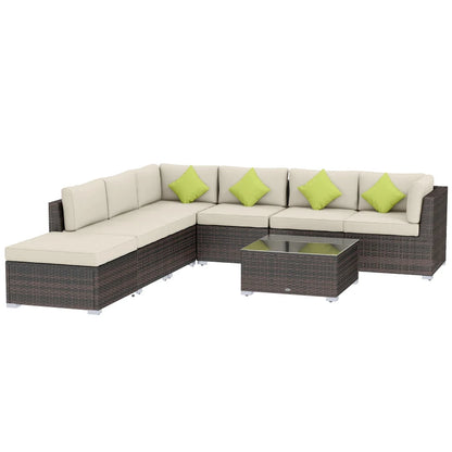 Sectional outdoor sofa with beige cushions and green pillows on a white background