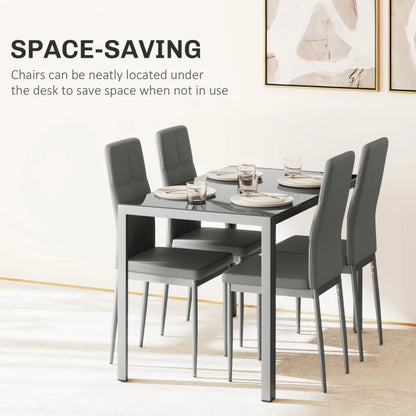 Dining table with chairs in a room setting, emphasizing space-saving feature.