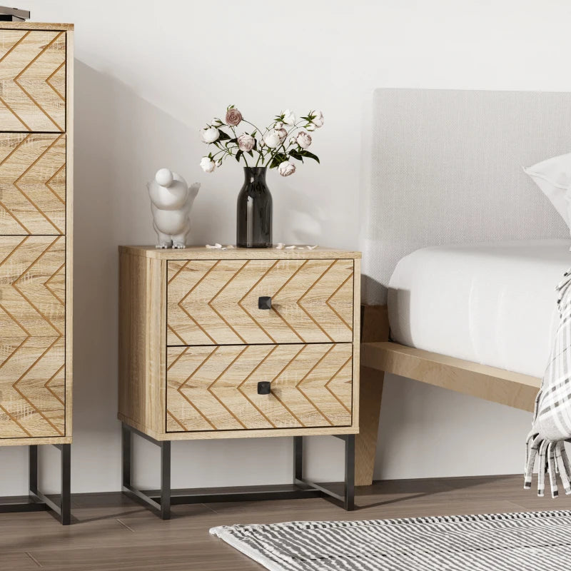 Wooden nightstand with chevron pattern next to a bed in a bedroom setting.